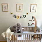 Décoration chambre bébé jungle vert avec guirlande prénom safari